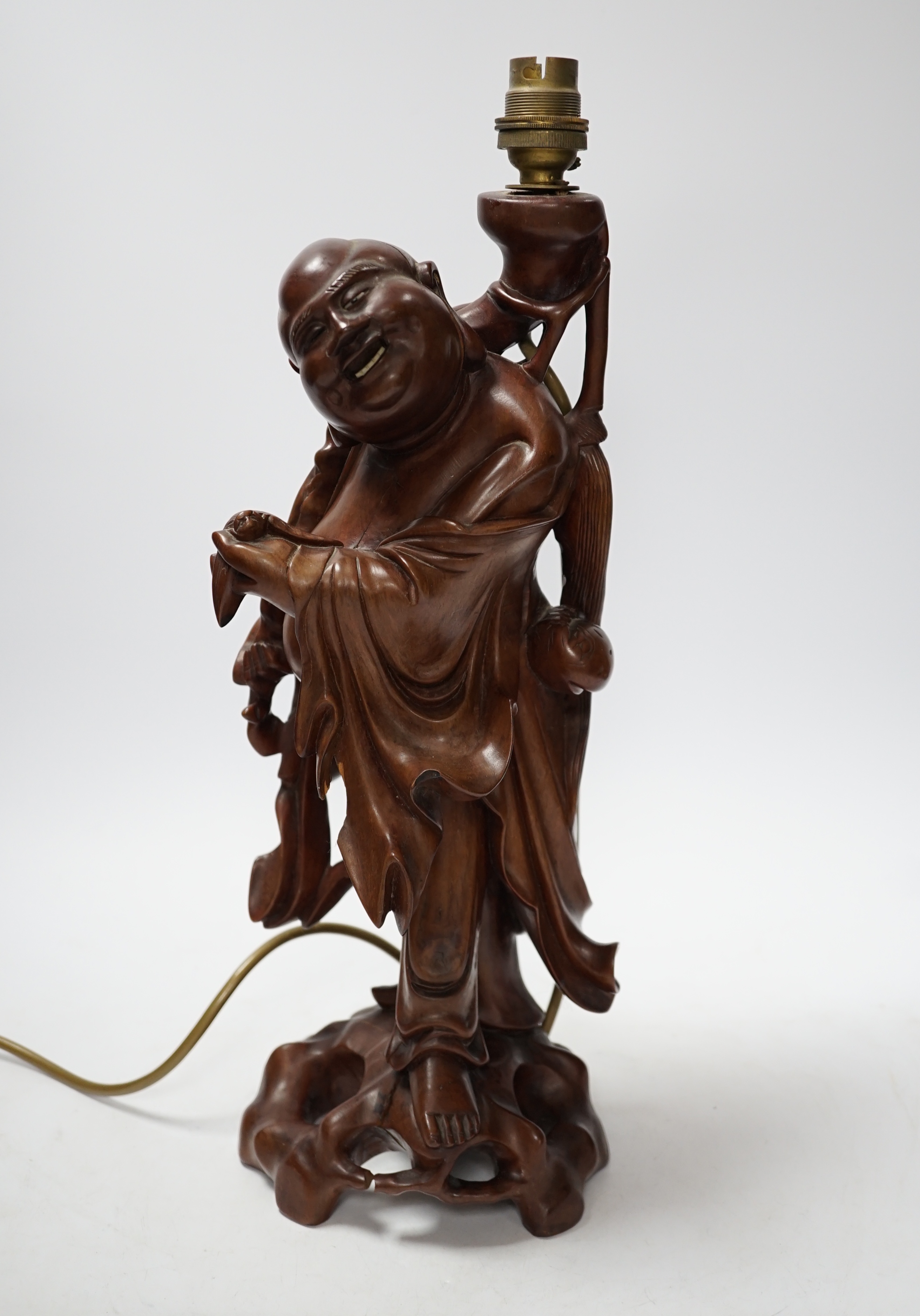 A Chinese carved hardwood figural table lamp base 42cm high